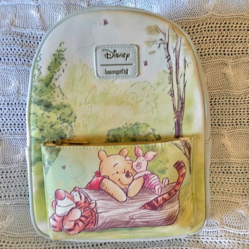 LOUNGEFLY x Disney Winnie the Pooh “Sketchbook” Mini Backpack.